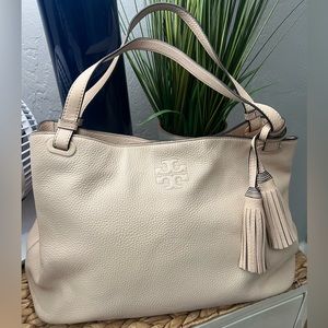 Authentic Tory Burch Thea hobo bag with tassels.  Nude/pink blush.